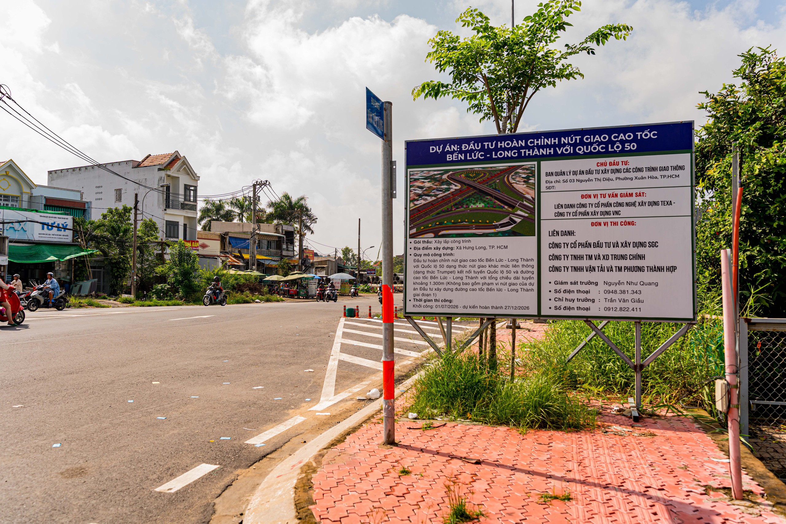 Gỡ xong "nút thắt" 250m, tuyến Quốc lộ 1.500 tỷ cửa ngõ phía Nam lột xác: Đường lớn mở đến đâu, nhà phố đua nhau mọc lên đến đó - Ảnh 10.